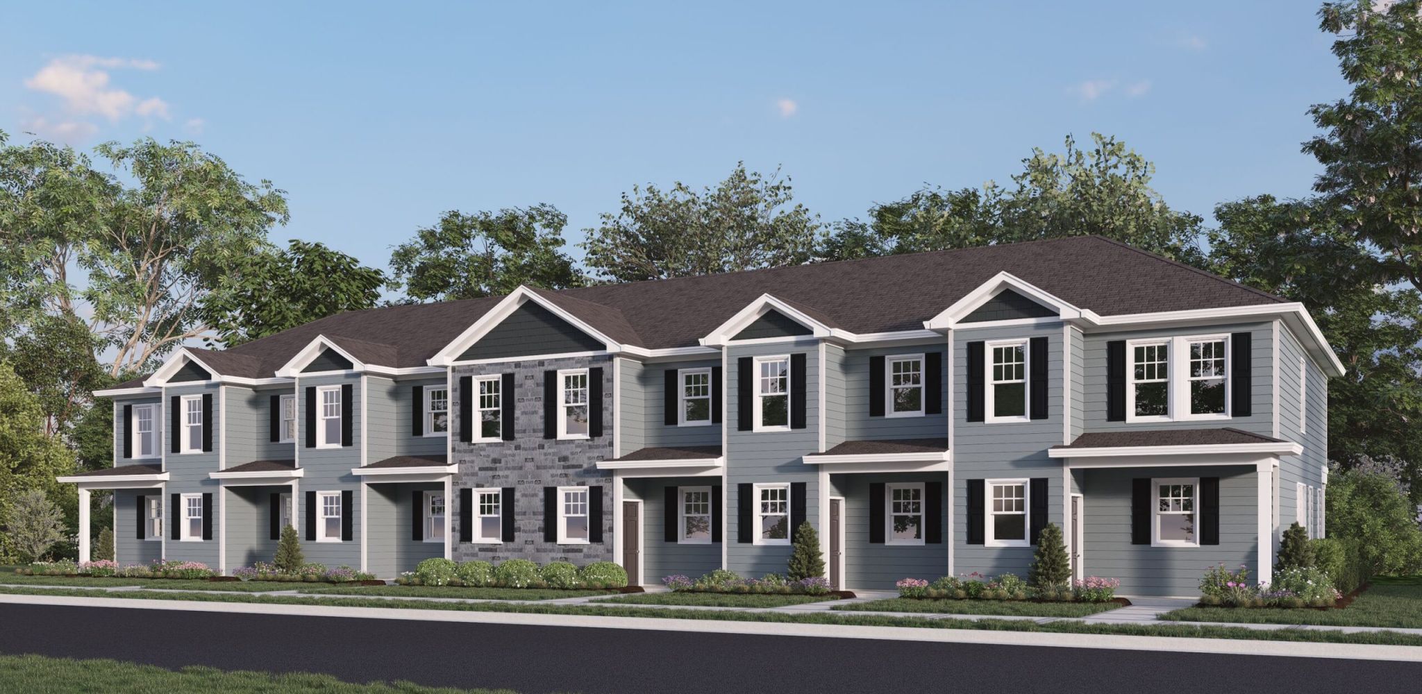 The Townes at Hatcher Creek apartment exterior rendering of multi story apartment building with cars parked in front